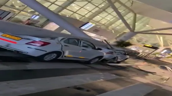 Vehicles crushed after a portion of the roof of the Delhi airport's Terminal-1 collapsed amid heavy rain, early Friday, June 28, 2024. One person died and five were injured in the collapse.