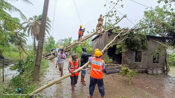 NDRF personnel remove an uprooted tree after the landfall of Cyclone 'Remal', Monday, May 27, 2024