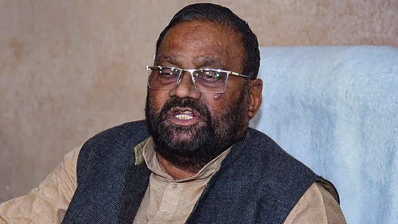 Former Samajwadi Party leader Swami Prasad Maurya addresses a press conference after he resigned from the party, in Lucknow