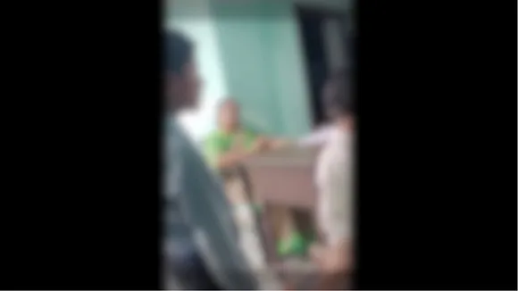 Classmates slap student
