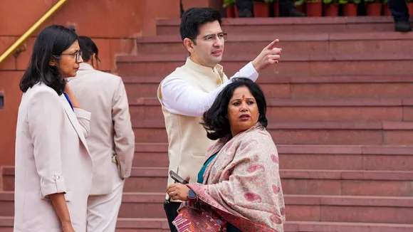 AAP MPs Raghav Chadha and Swati Maliwal with party MP Sanjay Singh's wife Anita arrives at Parliament House complex during the Budget session, in New Delhi, Monday, Feb. 5, 2024.