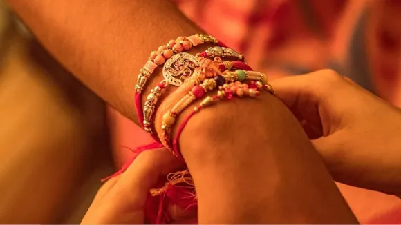 Tying Rakhi