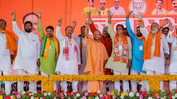 Uttar Pradesh Chief Minister Yogi Adityanath with other leaders during a campaign meeting for Lok Sabha elections at Mariahu, in Jaunpur, Wednesday, May 22, 2024