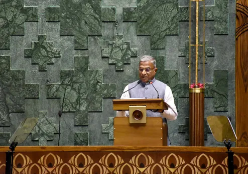 Rajya Sabha Deputy Chairman Harivansh Narayan Singh addresses during the inauguration of the new Parliament building, in New Delhi