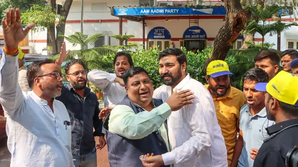 Delhi minister and AAP leader Imran Hussain celebrates with party workers after the Supreme Court granted interim bail to Delhi Chief Minister and AAP convenor Arvind Kejriwal till June 1, at party office, in New Delhi, Friday, May 10, 2024