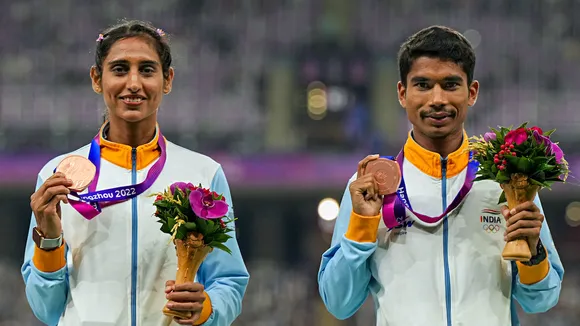 Bronze medalists India's Ram Baboo and Manju Rani pose for photos during the presentation ceremony of the 35km Race Walk Mixed Team event at the 19th Asian Games, in Hangzhou, China, Wednesday, Oct. 4, 2023.
