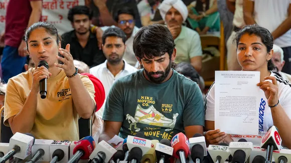 Wrestlers Bajrang Punia, Vinesh Phogat and Sakshi Malik address the media during their protest against Wrestling Federation of India (WFI) chief Brij Bhushan Sharan Singh at Jantar Mantar on May 14