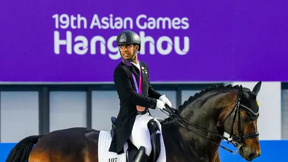 India’s Anush Agarwalla rides his horse Etro as he competes in the Equestrian Dressage Individual Final event at the 19th Asian Games, in Hangzhou, China
