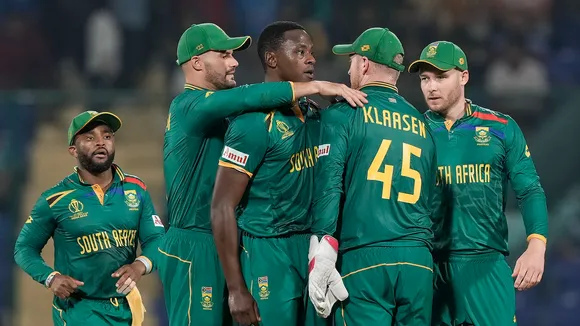 South Africa's bowler Kagiso Rabada celebrates with teammates after the wicket of Sri Lanka's batter Kusal Mendis during the ICC Men's Cricket World Cup match between Sri Lanka and South Africa, at the Arun Jaitley Stadium, in New Delhi, Saturday, Oct. 7, 2023.
