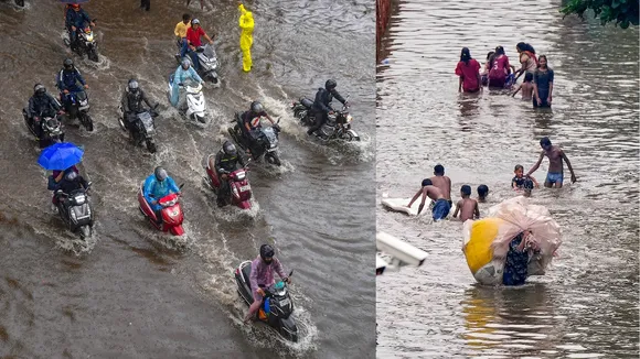 Commuters wade through a waterlogged street following rains in Mumbai on Monday, July 8, 2024