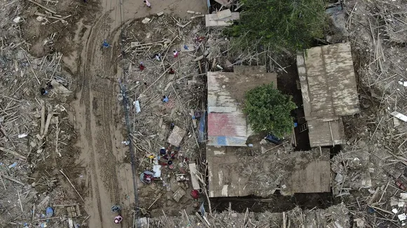 In this aerial image of the Kathmandu valley, debris is seen in Kathmandu, Nepal, Monday, Sept. 30, 2024 in the aftermath of a flood caused by heavy rains