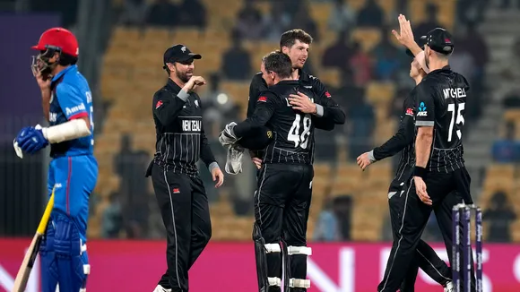 New Zealand team celebrates after winning the ICC Men's Cricket World Cup 2023 match against Afghanistan, at M. A. Chidambaram Stadium, in Chennai, Wednesday, Oct. 18, 2023.