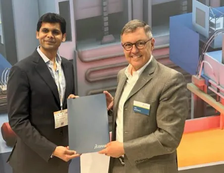 Managing Director of Jindal Stainless (JSL) Ltd Abhyuday Jindal (L) signs a pact with VP, Worldwide Business Transformation, Dassault Systemes, Eric Leveugl, in Dusseldorf