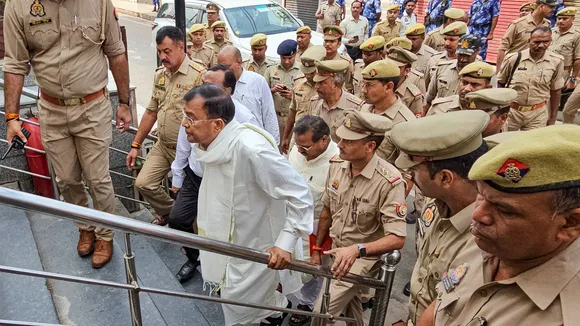 Surajpal alias Bhole Baba arrives to appear before a three-member judicial commission probing the July 2 stampede at his Hathras congregation, in Lucknow, Oct. 10, 2024.