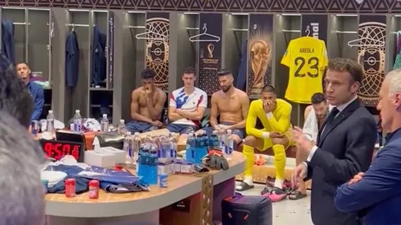 President Emmanuel Macron consoles French World Cup team after loss