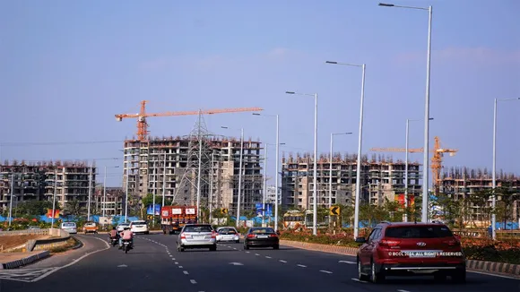 Buildings cars construction site road traffic