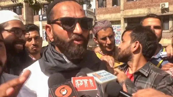 AAP candidate Mehraj Malik talks to the media after he won from Doda Assembly seat, in Doda, J & K, Tuesday, Oct. 8, 2024.