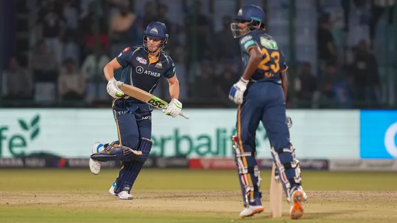 Gujarat Titans batters David Miller and Sai Sudharsan run between the wickets during the IPL 2023 cricket match between Delhi Capitals and Gujarat Titans at the Arun Jaitley Stadium on April 4