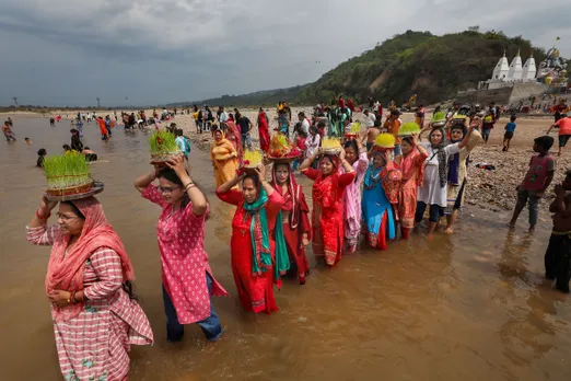 Women take bath in Tawi river Saakh Jammu Ashtami