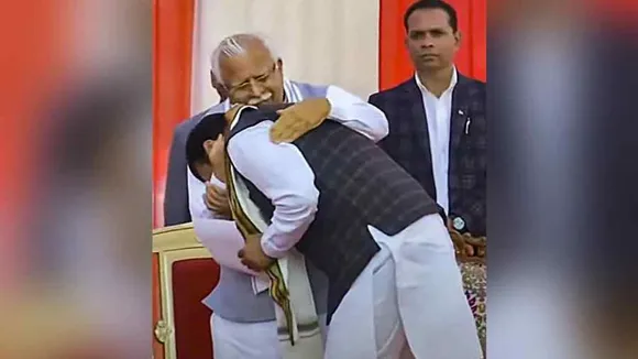 New Haryana Chief Minister Nayab Singh Saini with former state chief minister Manohar Lal Khattar during his oath-taking ceremony