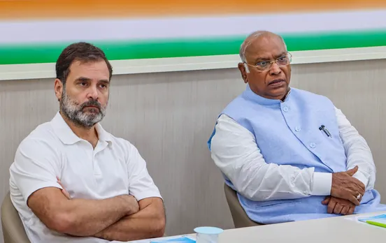 Congress President Mallikarjun Kharge with party leader Rahul Gandhi during a meeting on Uttarakhand, at the party headquarters in New Delhi, Thursday.jpg