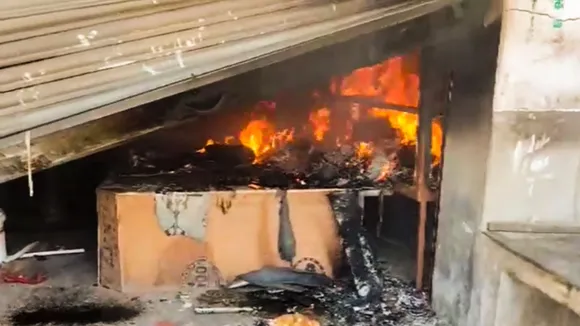 Fire at a shop during a protest at Nandigram, in Purba Medinipur district, Thursday, May 23, 2024