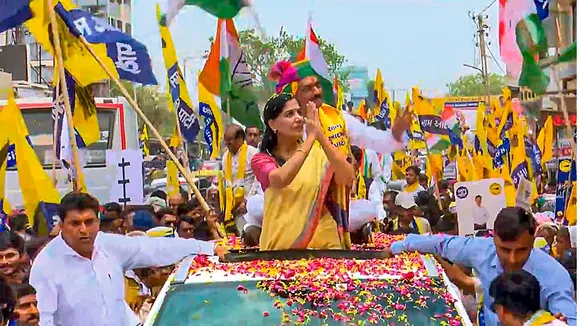 Jailed Delhi Chief Minister Arvind Kejriwal's wife Sunita Kejriwal during a roadshow in support of AAP candidate from Bhavnagar constituency Umesh Makwana
