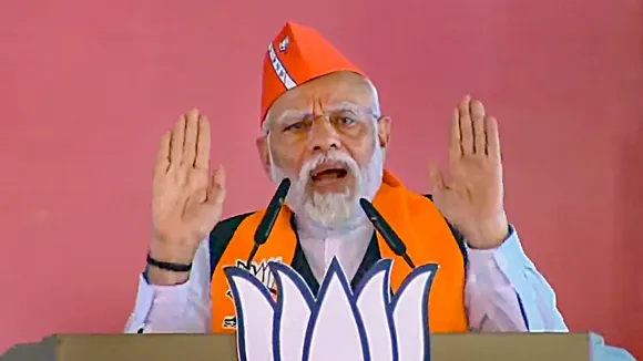 Prime Minister Narendra Modi addresses during a public meeting ahead of Madhya Pradesh Assembly elections, in Sidhi