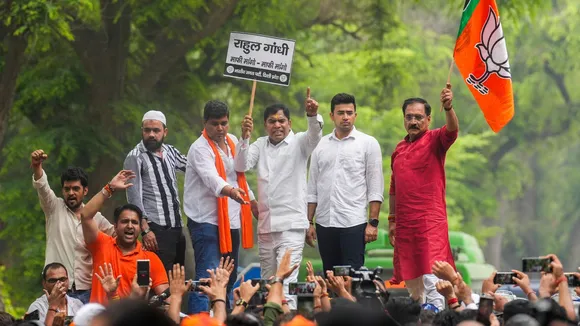 Delhi BJP President Virendra Sachdeva with party leaders during a protest against Congress leader Rahul Gandhi's remarks, in New Delhi, Wednesday, July 3, 2024.