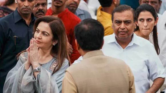 Reliance Industries chairman Mukesh Ambani with his wife Nita Ambani arrives to pay his last respects to industrialist Ratan Tata, at NCPA lawns in Mumbai, Thursday, Oct. 10, 2024.