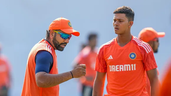India's captain Rohit Sharma with teammate Yashasvi Jaiswal during a practice session