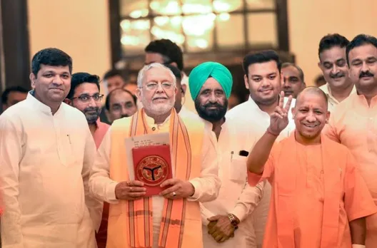 UP Finance Minister Suresh Khanna with Chief Minister Yogi Adityanath before presenting state budget