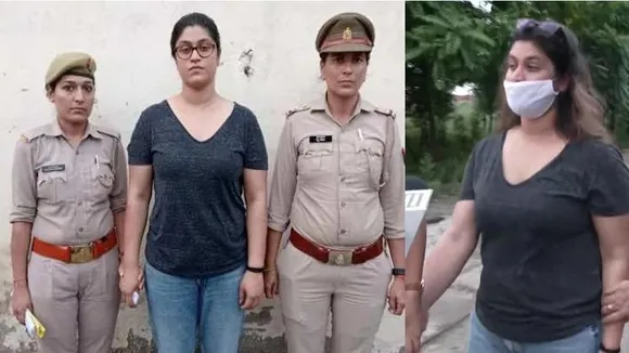 Noida resident Bhavya Roy being taken in police custody
