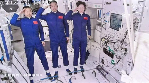 (Left to Right) Shenzhou-14 taikonauts Cai Xuzhe, Chen Dong and Liu Yang   made a salute to the motherland and Chinese compatriots on earth after the third crew of China's Space Station entered the Tianhe core module 