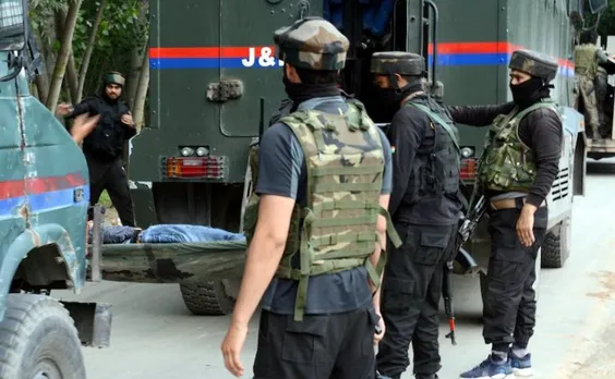 J&K Police personel with LeT terrorist Adil Parray's body