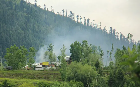 Smoke rises from a house during an encounter with terrorists in Jammu