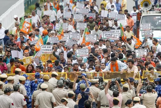 BJP activists protest against the Delhi governments Excise Policy, in New Delhi