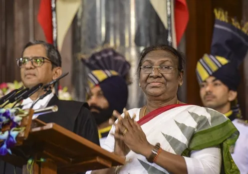 Droupadi Murmu after she was sworn-in as the 15th President of India by CJI Justice N V Ramana (L) in the Central Hall of Parliament, in New Delhi