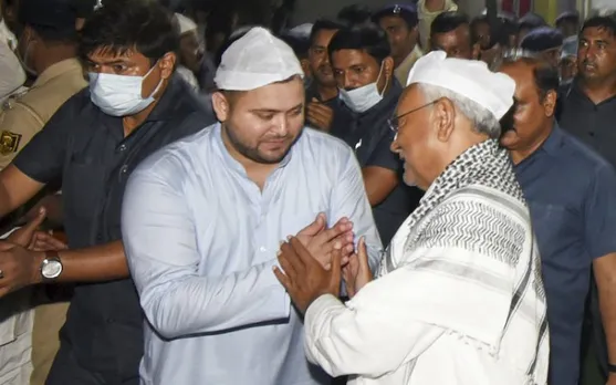 Tejashwi Yadav greeting Nitish Kumar at Iftar party