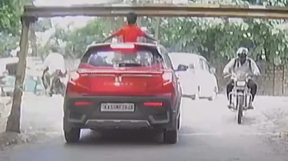 KID HURT BY TRAFFIC BARRIER