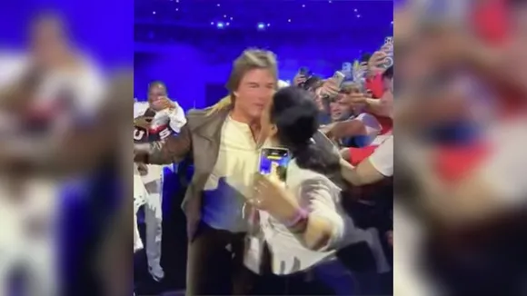 Paris Olympics: Woman grabs Tom Cruise forcefully, kisses him! Act spurs debate online!