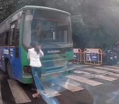Bengaluru : BMTC bus driver’s shocking attempt to run over woman.. Narrow escape!