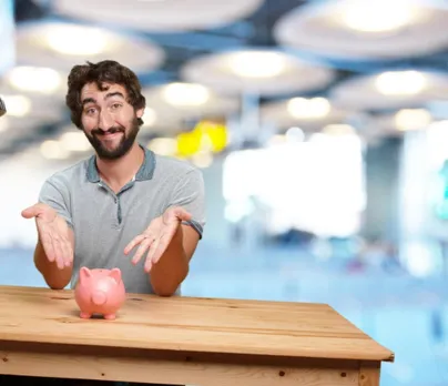 crazy-young-man-with-table-happy-expression