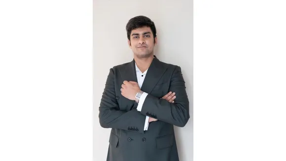 Dynamic RGB dimmable lighting illuminating modern hotel façade at night