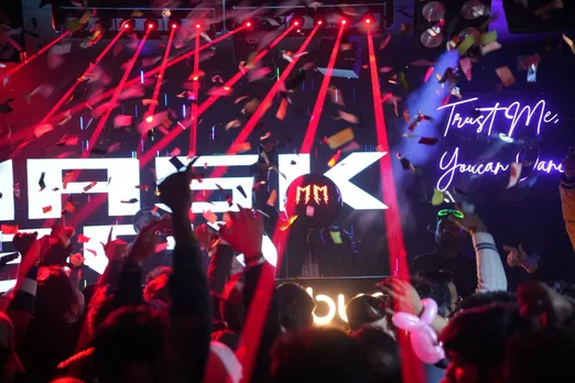 Crowd dancing under red lasers as DJ MaskBox performs Sunburn Select set at Club Encore Noida