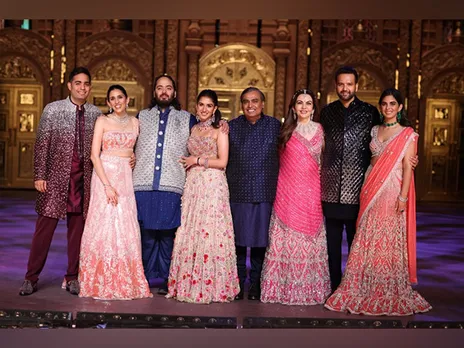 Family (L to R) Mr Akash Ambani, Mrs Shloka Ambani, Mr Anant Ambani, Mrs Radhika Ambani, Mr Mukesh Ambani, Mrs Nita Ambani, Mr Anand Piramal, Mrs Isha Ambani