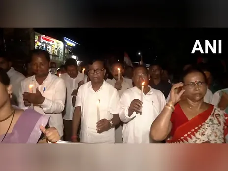 Congress leaders holds a candle light protest against the Balasore Self-immolation case. (Photo/ANI)