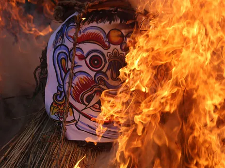 Locals welcome the festive season by burning Ghantakarna effigy (Image/ANI)