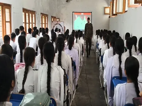 Indian Army officials at Government Higher Secondary School, Khour (Photo/ANI)