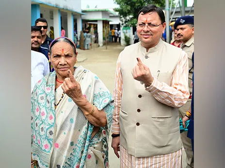 Uttarakhand CM Pushkar Singh Dhami and mother Bishna Devi after casting vote for Panchayat elections (File Photo/ANI)
